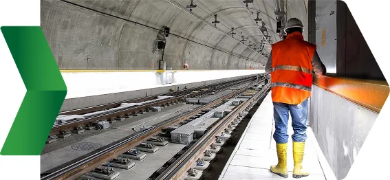 Profissional realizando manutenção nos trilhos de um metrô ilustrando as concessões da Horiens.